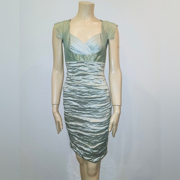 Nicole Miller Dresses & Skirts - Nicole Miller Satin light blue shiny dress with gold accents size 0 NWT
